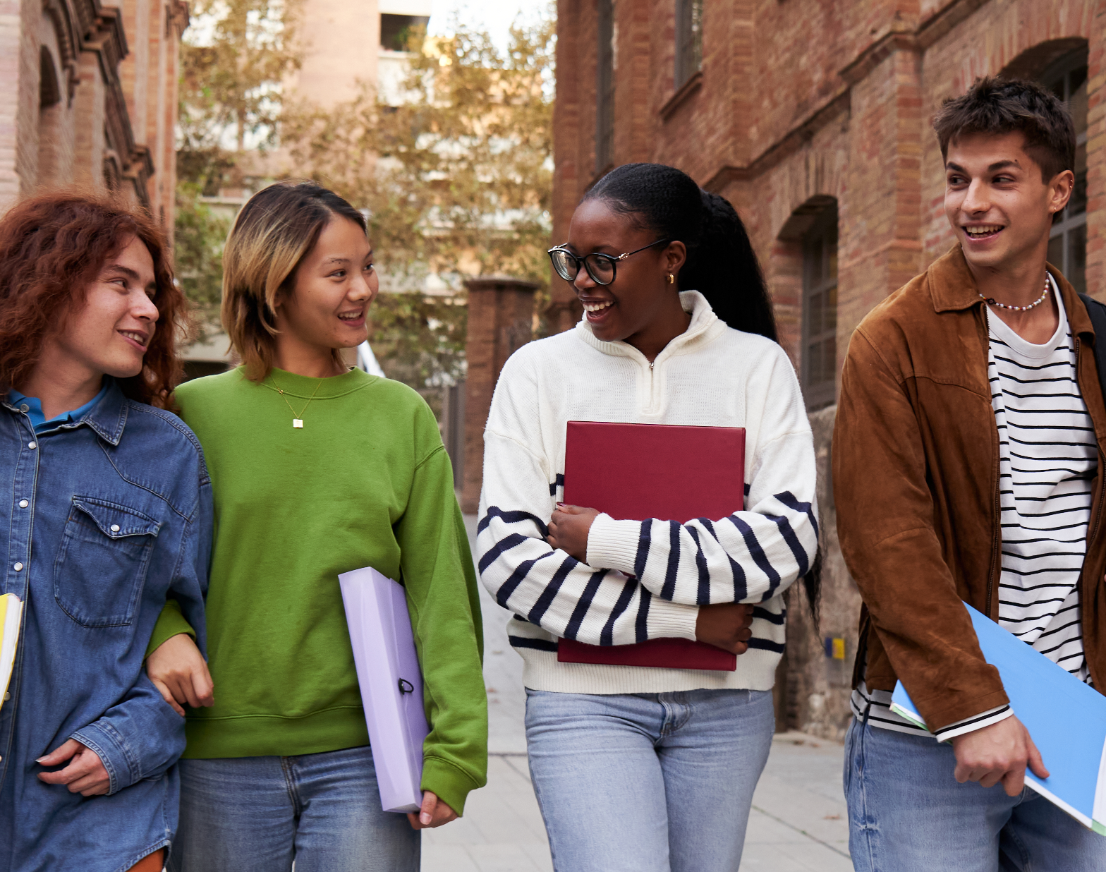 Teenagers walking on a city street